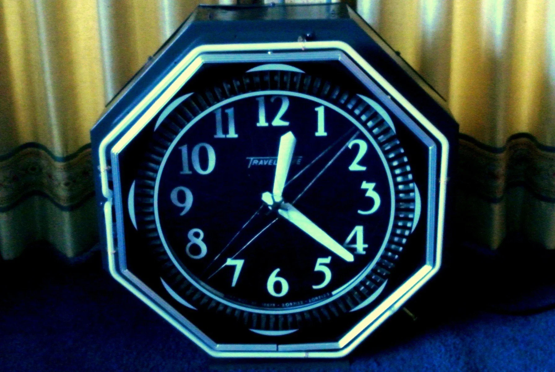 EXPERT NEON CLOCK RESTORATION OF TRAVEL TIME SPINNER NEON CLOCK by John Barton - BartonNeonMagic.com