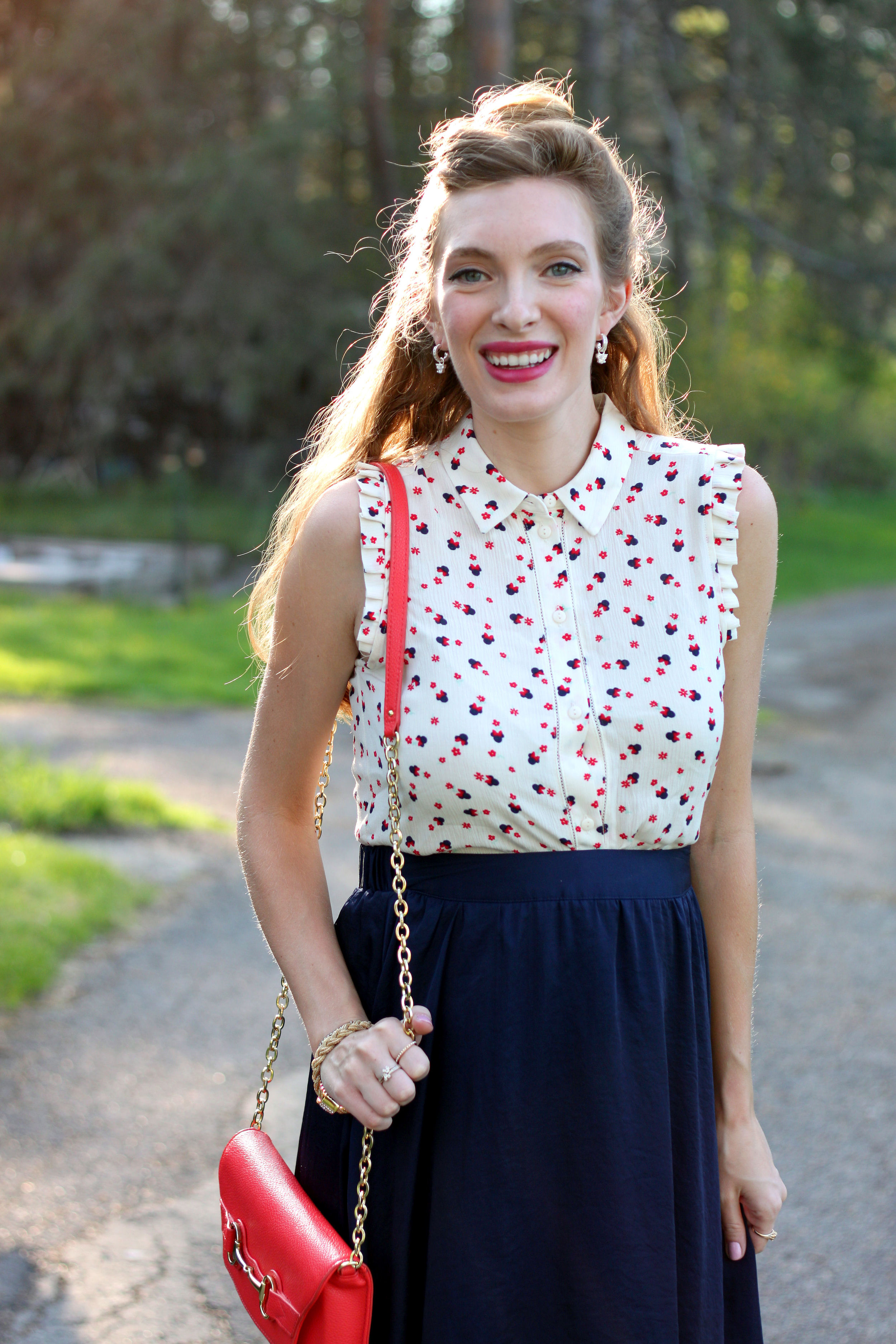 Lauren Conrad looks stylish in polka dot blouse and trendy maroon