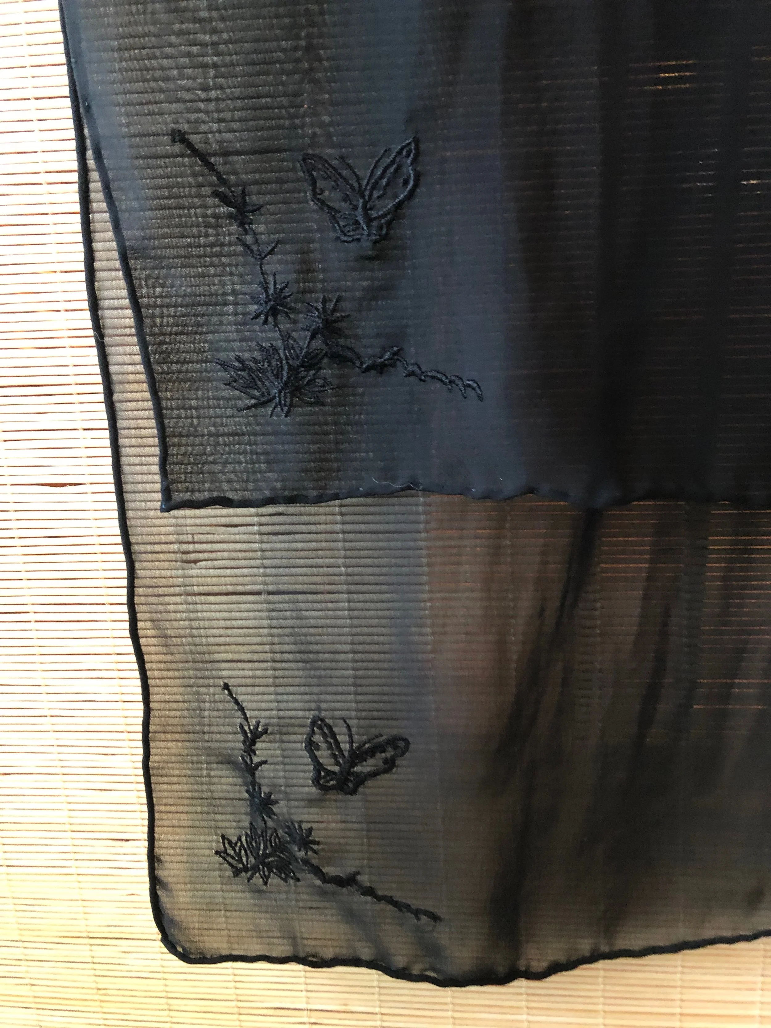 Silk scarf with hand sewn detail