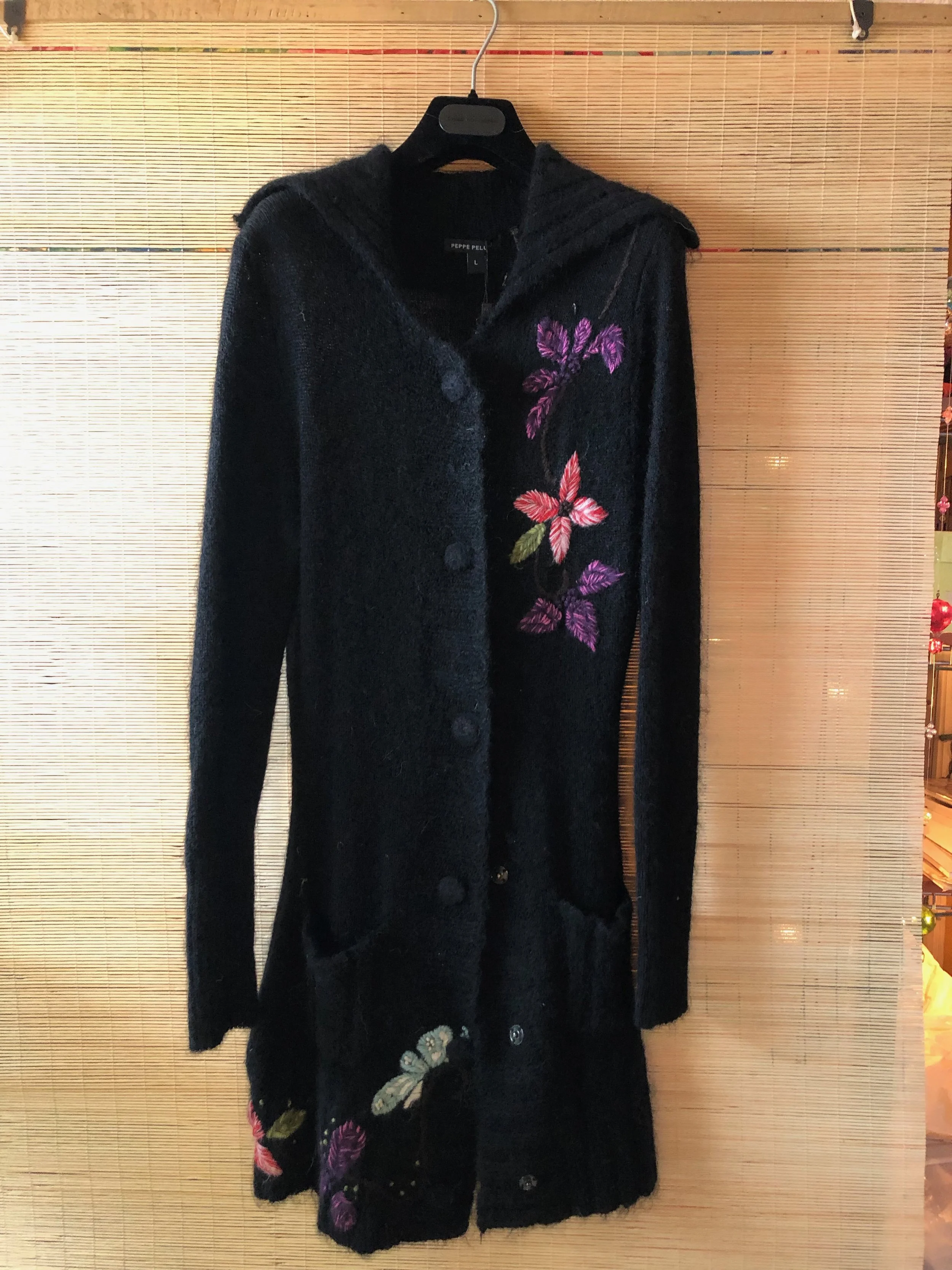 Wool long sweater with hand sewn detail by