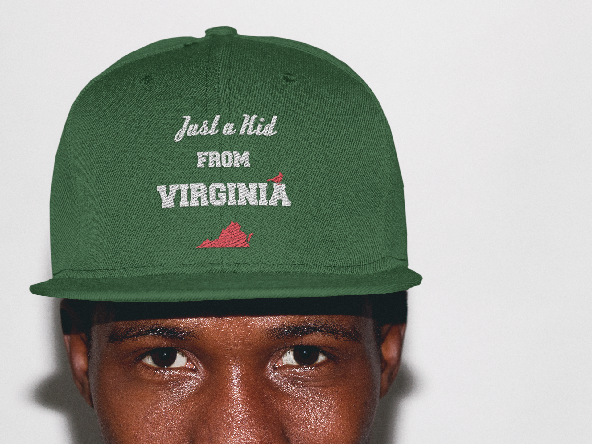trendy-black-guy-in-a-studio-wearing-a-snapback-mockup-a11777 (1).png