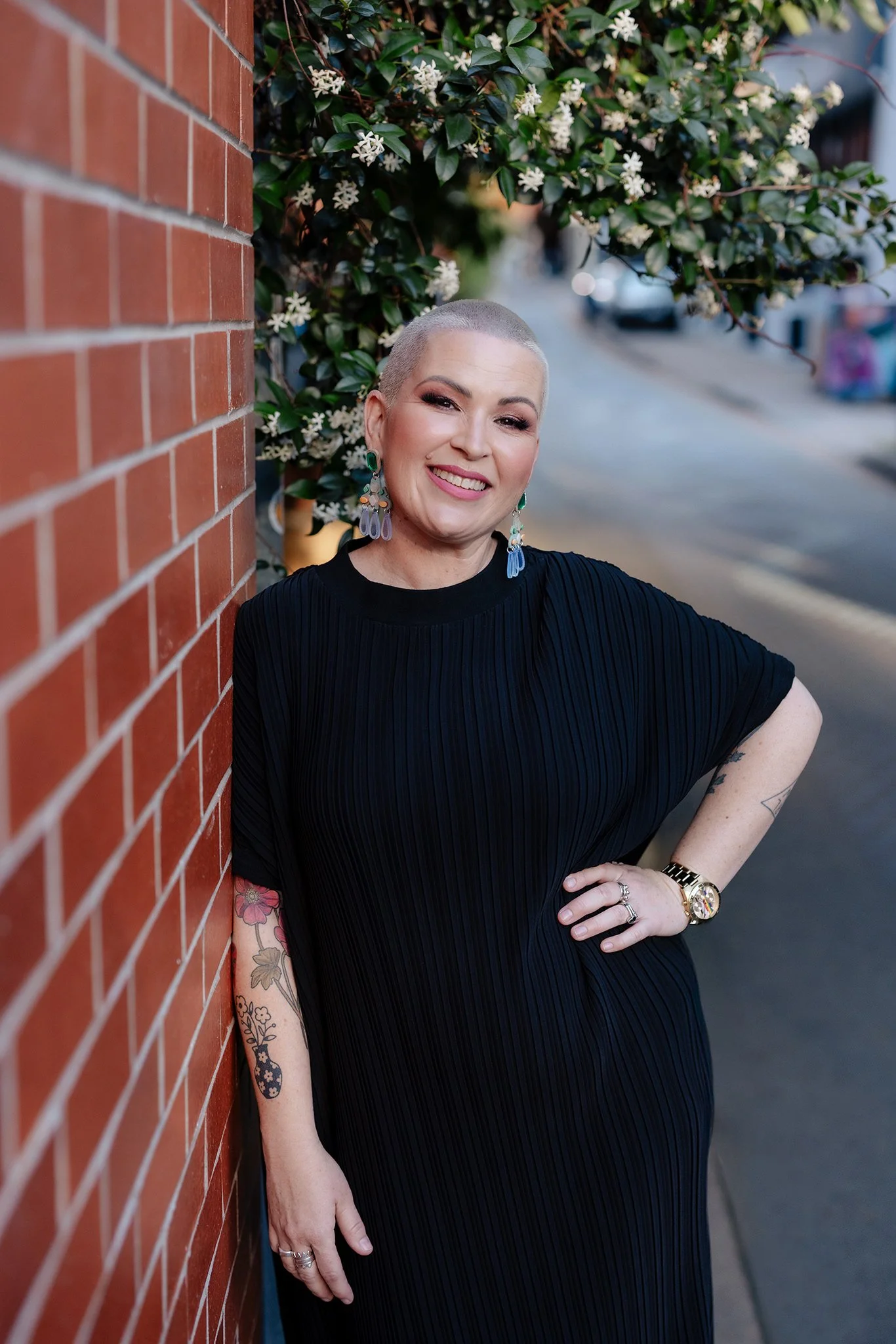 Portrait of Brisbane Marriage Celebrant Erin Woodhall looking at the camera and smiling