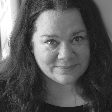 Black and white headshot image of Cara Holland