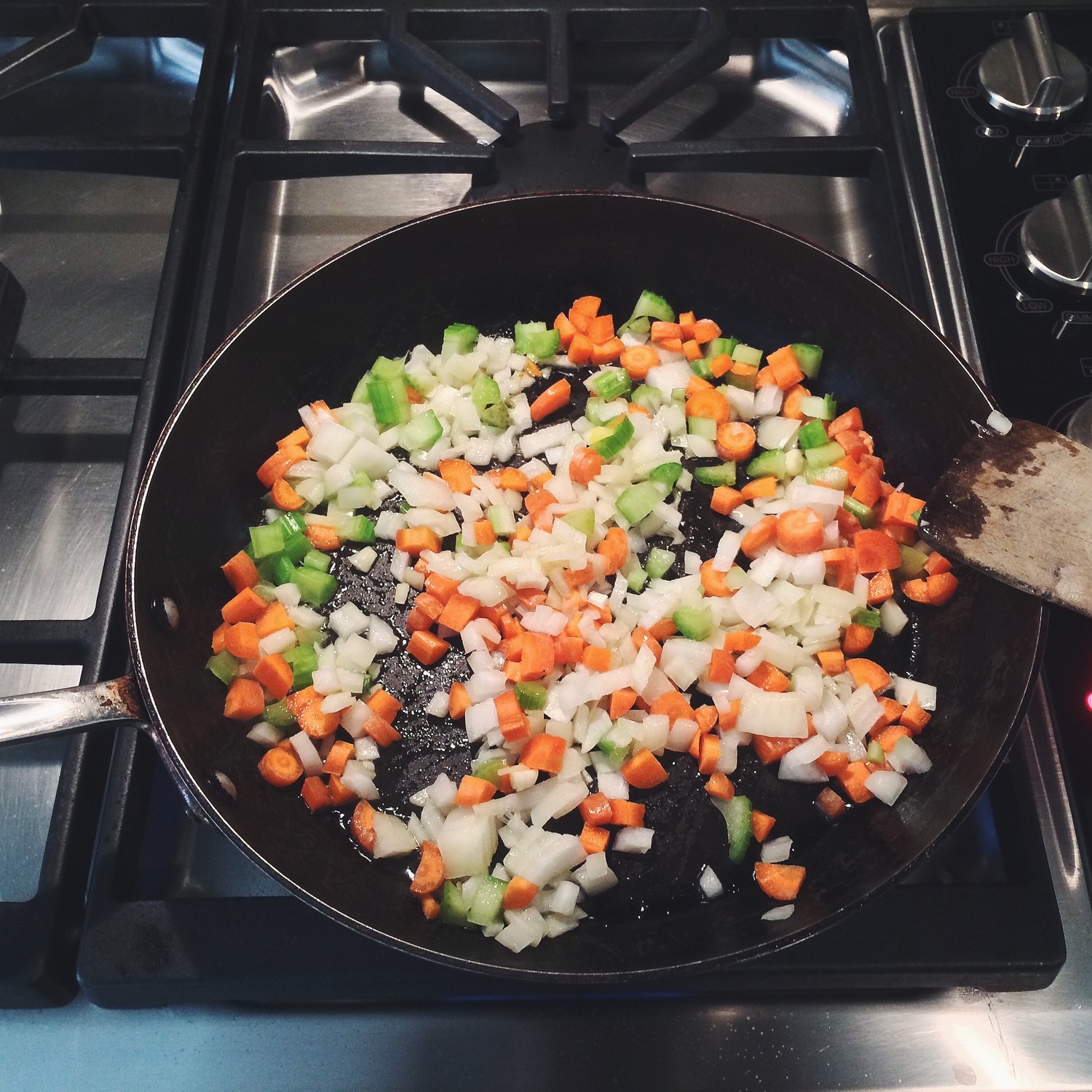   Preheat oven to 350°F.    Finely chop the onions, carrots, and celery.  Sautée on medium heat until onions are fragrant and lightly golden. Be sure to let the mixture cool down.&nbsp;   