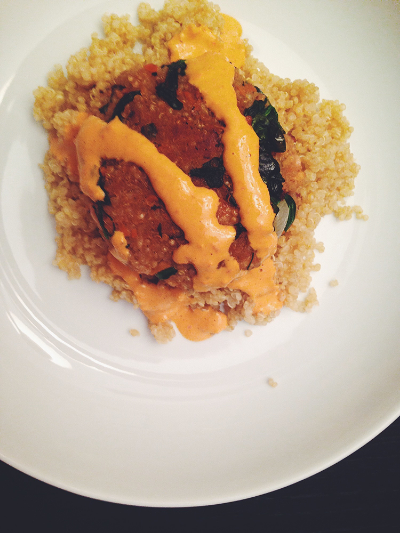  Tahini red pepper sauce drizzled over quinoa-white bean-spinach patties. 