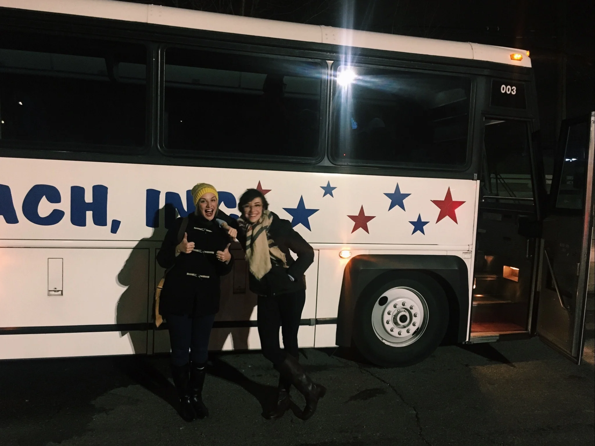 Super cool in front of the tour bus.