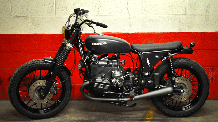 - vintage Honda tank; - we had it painted in mat dark grey to give this "stealth" look and feel to the motorcycle; - brand new TCI / CDI ignition system.