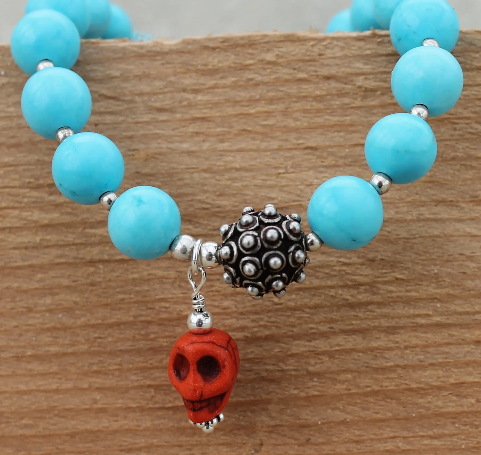 red/orange skull bracelet