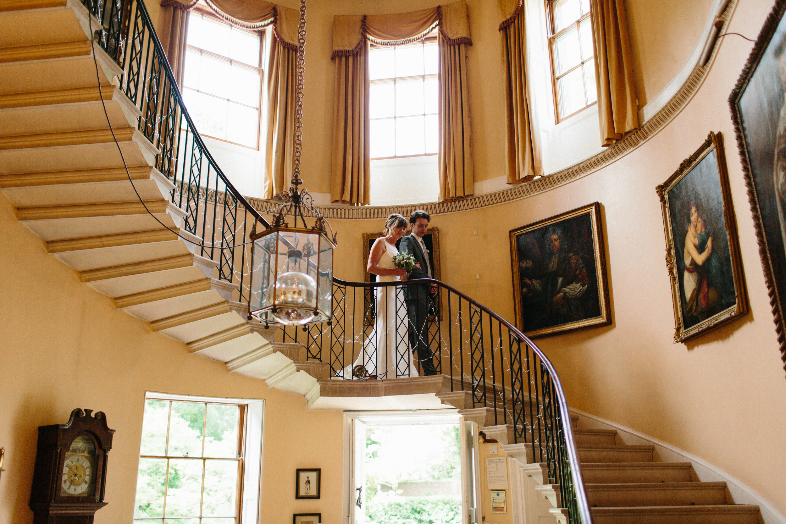 bride sweeping staircase