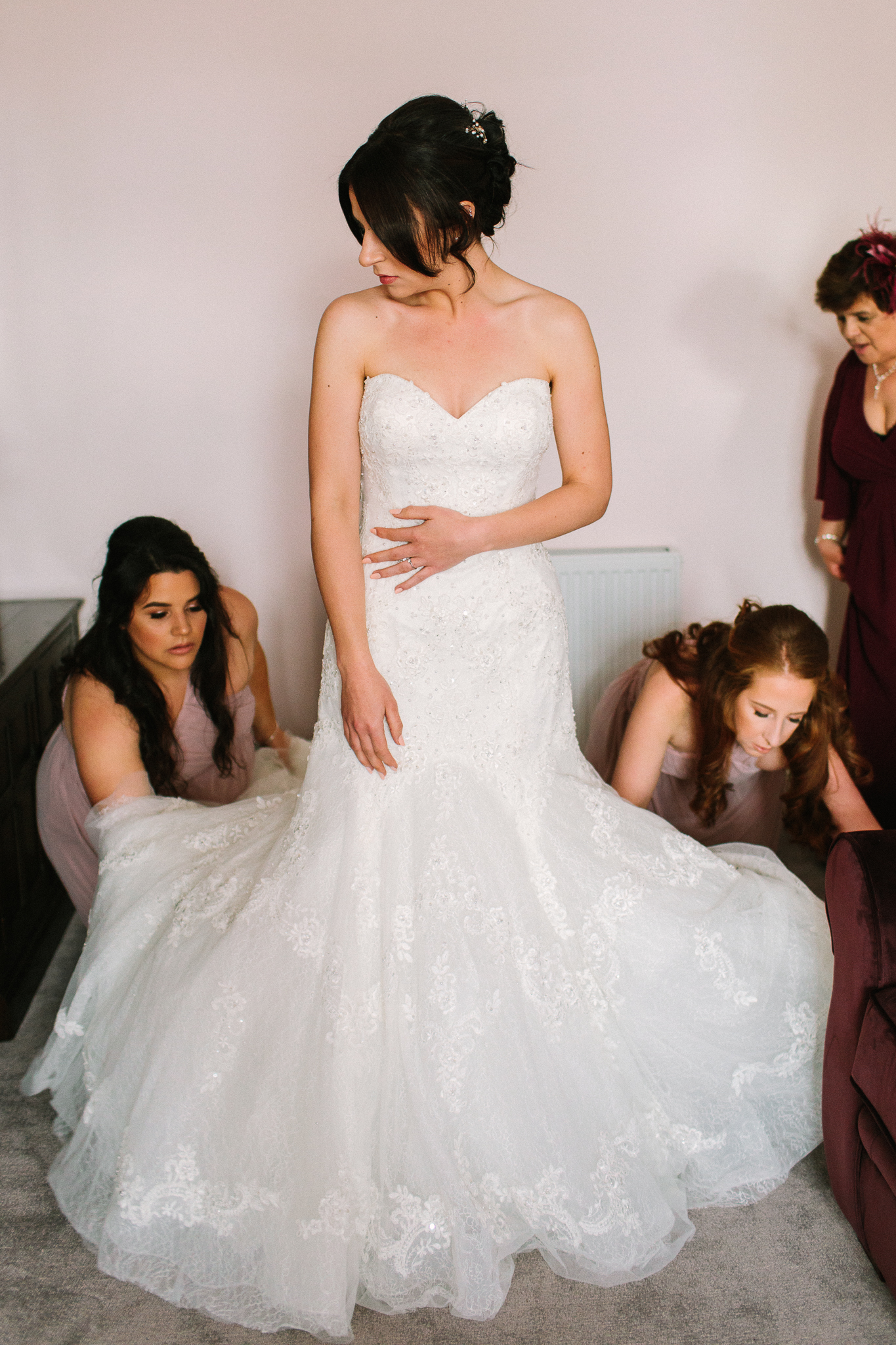 getting into the wedding dress