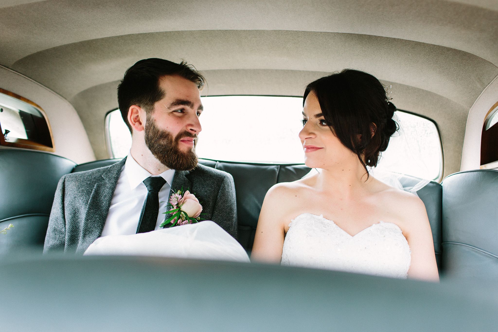 couple in the wedding car