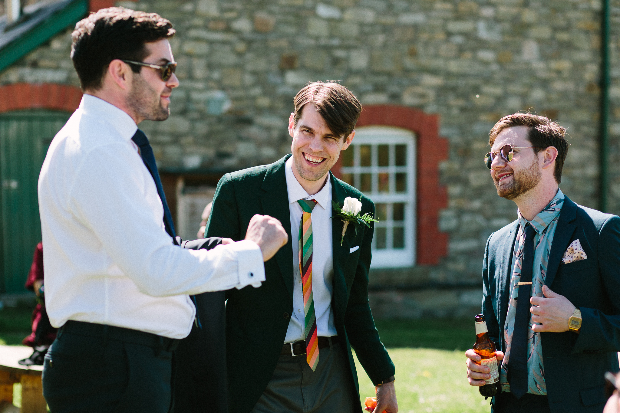 groom prep outdoor wedding