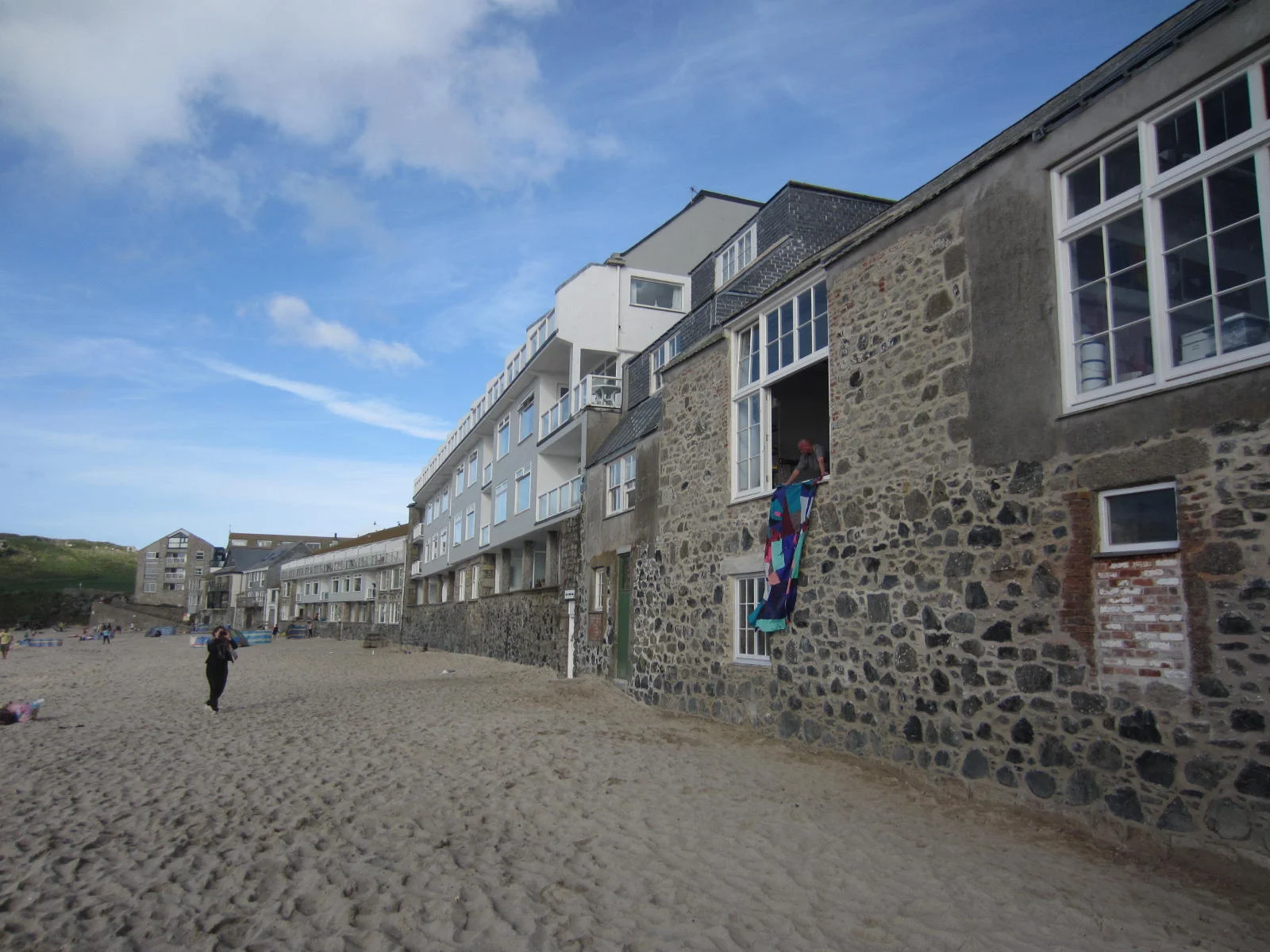 We explained what we were doing in St. Ives with our flag. We could not get on the roof, so Sax held our flag out of the window. Referencing the hoisting we had originally intended.