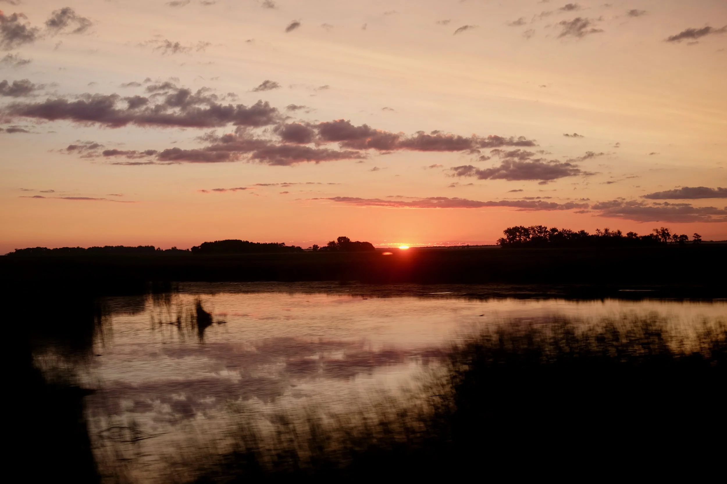 The sun rising near Devil's Lake, North Dakota.