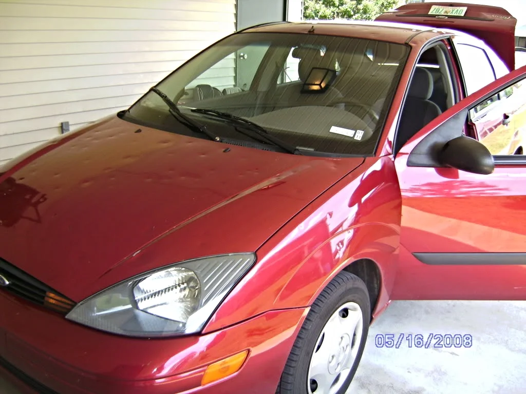 hail.damage.to.vehicle.richards.collision.center.kansas.city.jpg