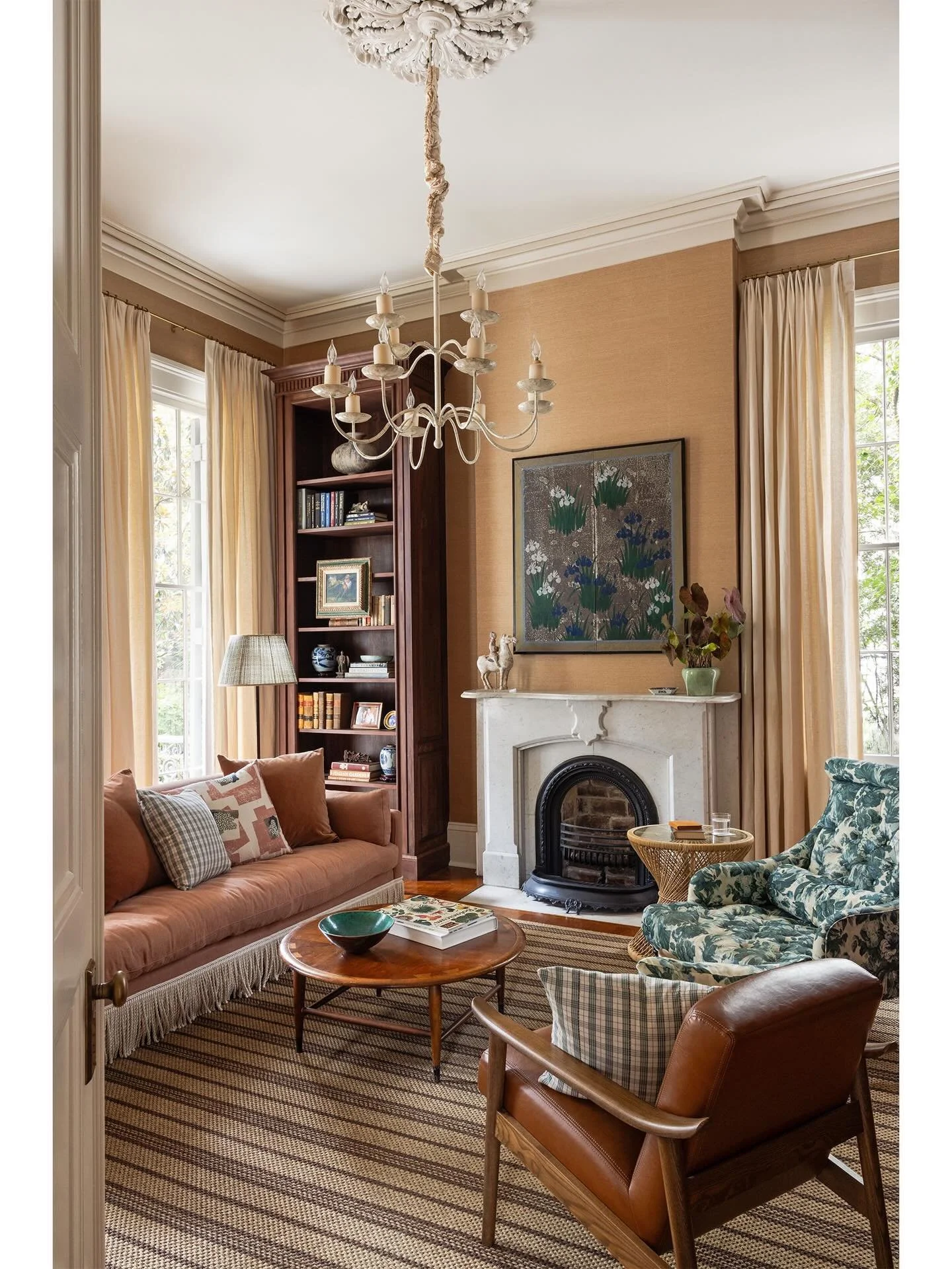 The library in a 170 year old Greek Revival center hall home recently captured for @entablaturenola. Situated in the Garden District, the historic renovation preserves and honors the past, and the design choices seamlessly blend with the home&rsquo;s