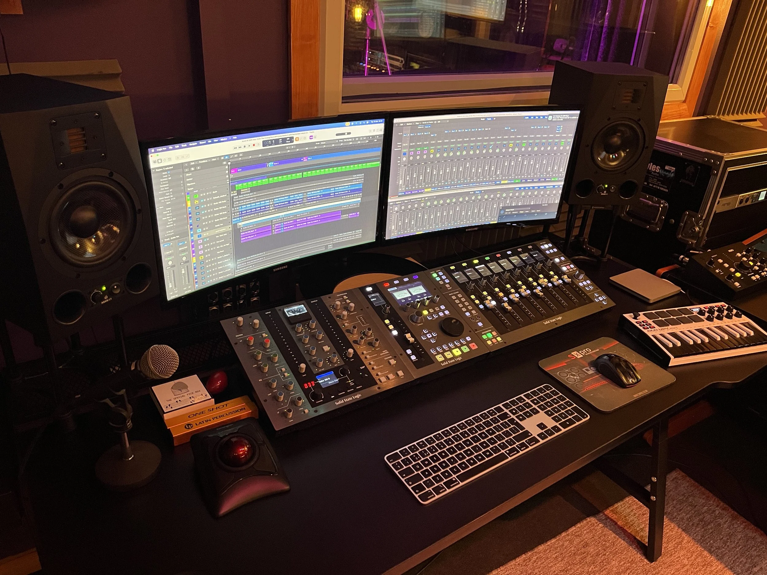 Production workstation at Styles Recording Studio in Exeter, with dual screens, keyboard and studio monitors