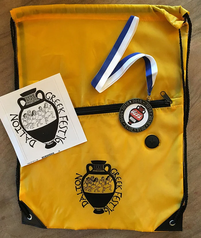 Backpack, sticker and medal logo for the Dalton School Greek Festival