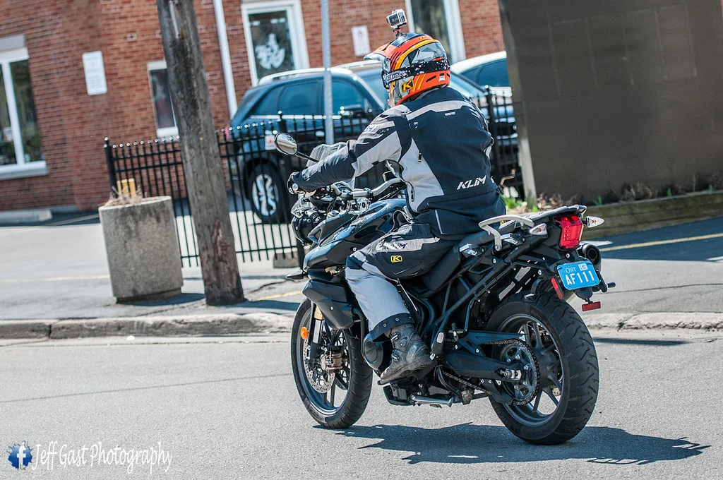  Taking off on the Triumph Tiger 800. Thanks Rob! - Photo by Jeff Gast