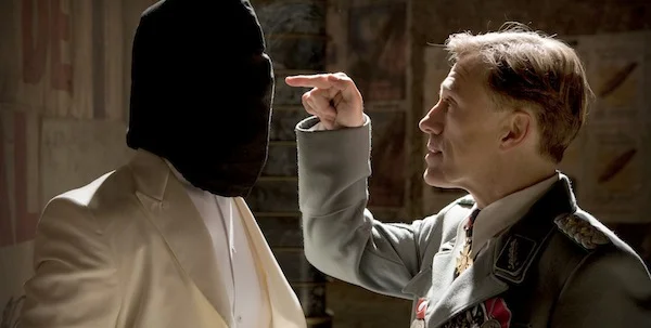 Christoph Waltz and a bagged Brad Pitt in Quentin Tarantino's Inglourious Basterds