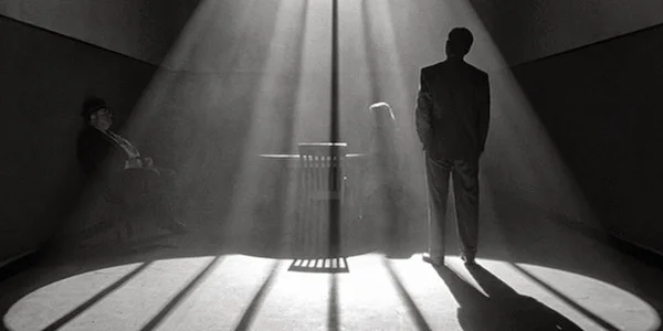 Tony Shalhoub and Frances McDormand in Joel Coen and Ethan Coen's The Man Who Wasn't There
