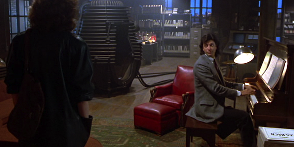 Jeff Goldblum plays the piano for Geena Davis in David Cronenberg's The Fly