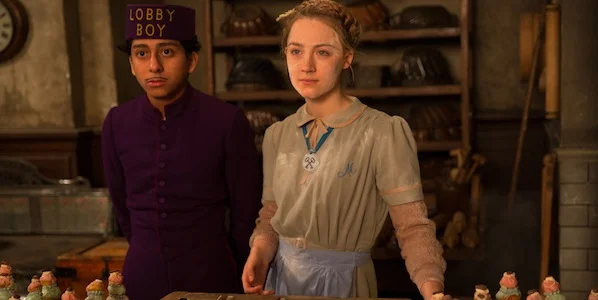 Tony Revolori and Mia Wasikowska in Wes Anderson's The Grand Budapest Hotel
