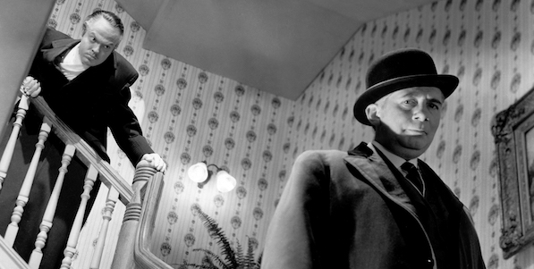 Orson Welles and Ray Collins in Welles' Citizen Kane .