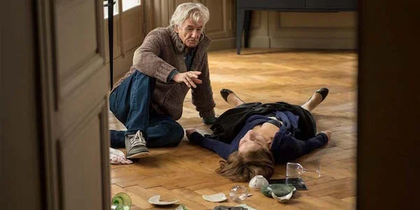 Paul Verhoeven and Isabelle Huppert on the set of Elle