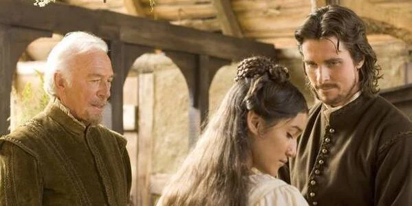 Christopher Plummer, Q’orianka Kilcher, and Christian Bale in Terence Malick’s The New World
