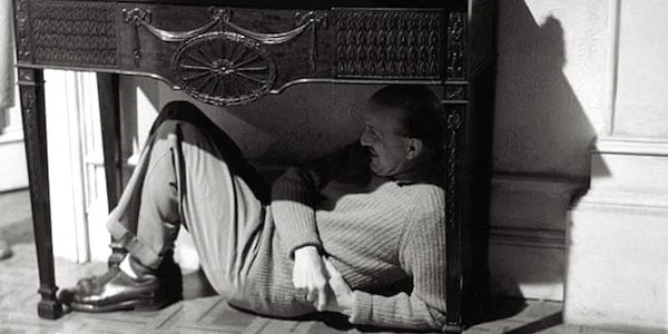 Michael Powell finds a camera angle on the set of Peeping Tom
