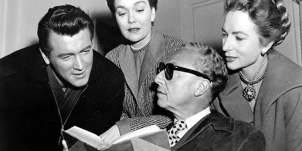 Douglas Sirk (center, in shades) on the set of All That Heaven Allows with Rock Hudson, Jane Wyman, and Agnes Moorhead