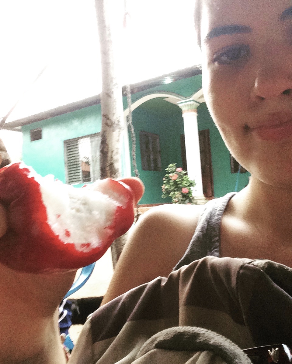 Eating a strange fruit and praying I don't get sick (I didn't). 
