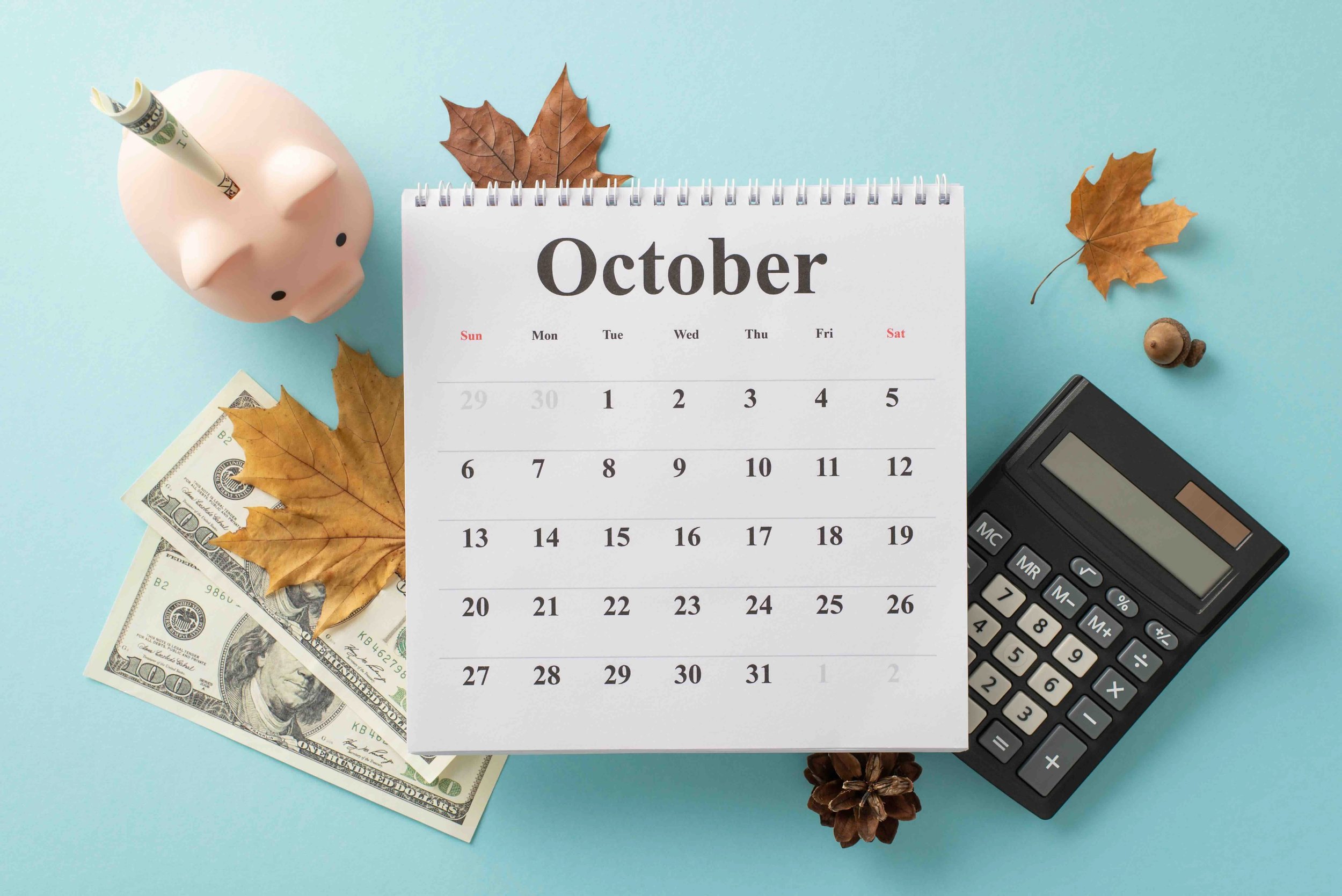 Image of october calendar and leaves.