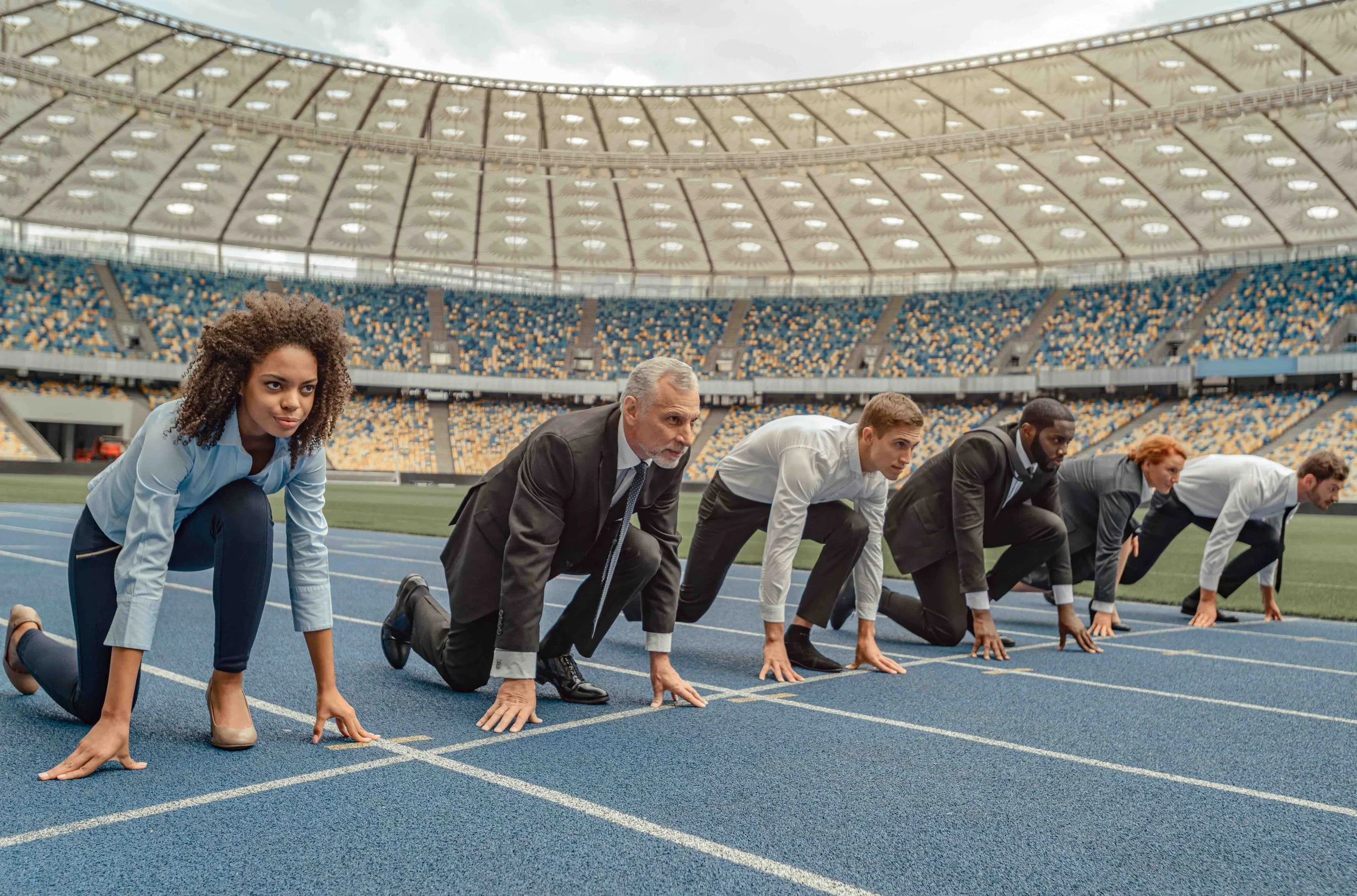 Business people ready to start a race