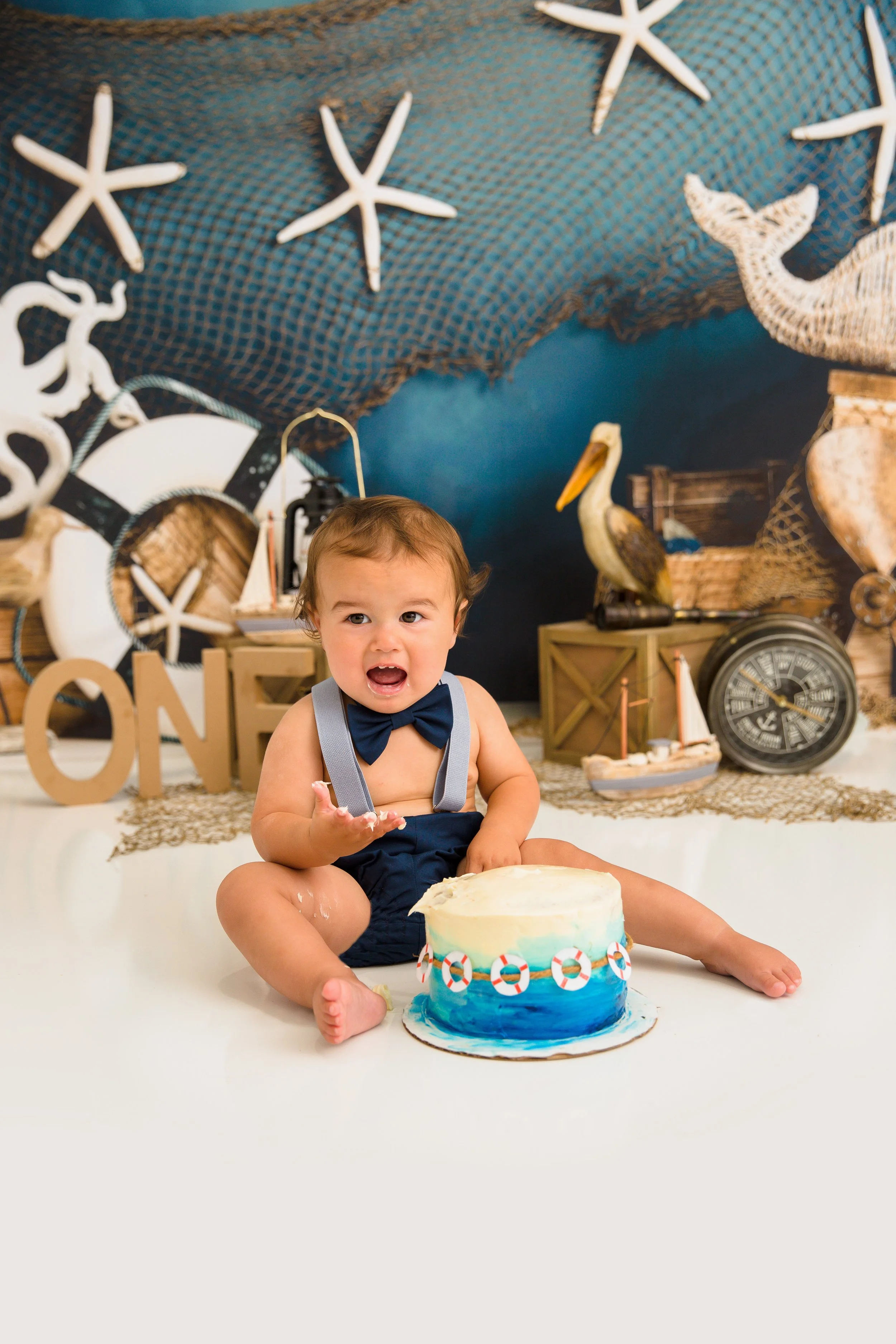 Reese-Nautical-cake-smash-nashville-cakesmash-photographer-chelsea-meadows-photography-(45).jpg