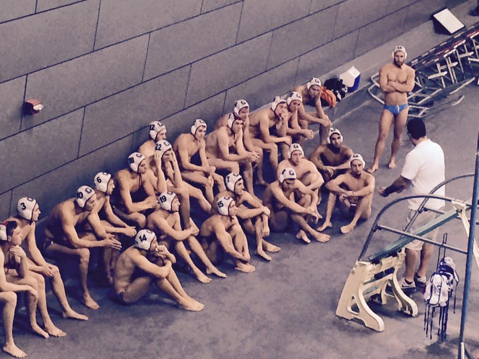 Coach James Dauphinee planning for the second half with the Buckeyes.