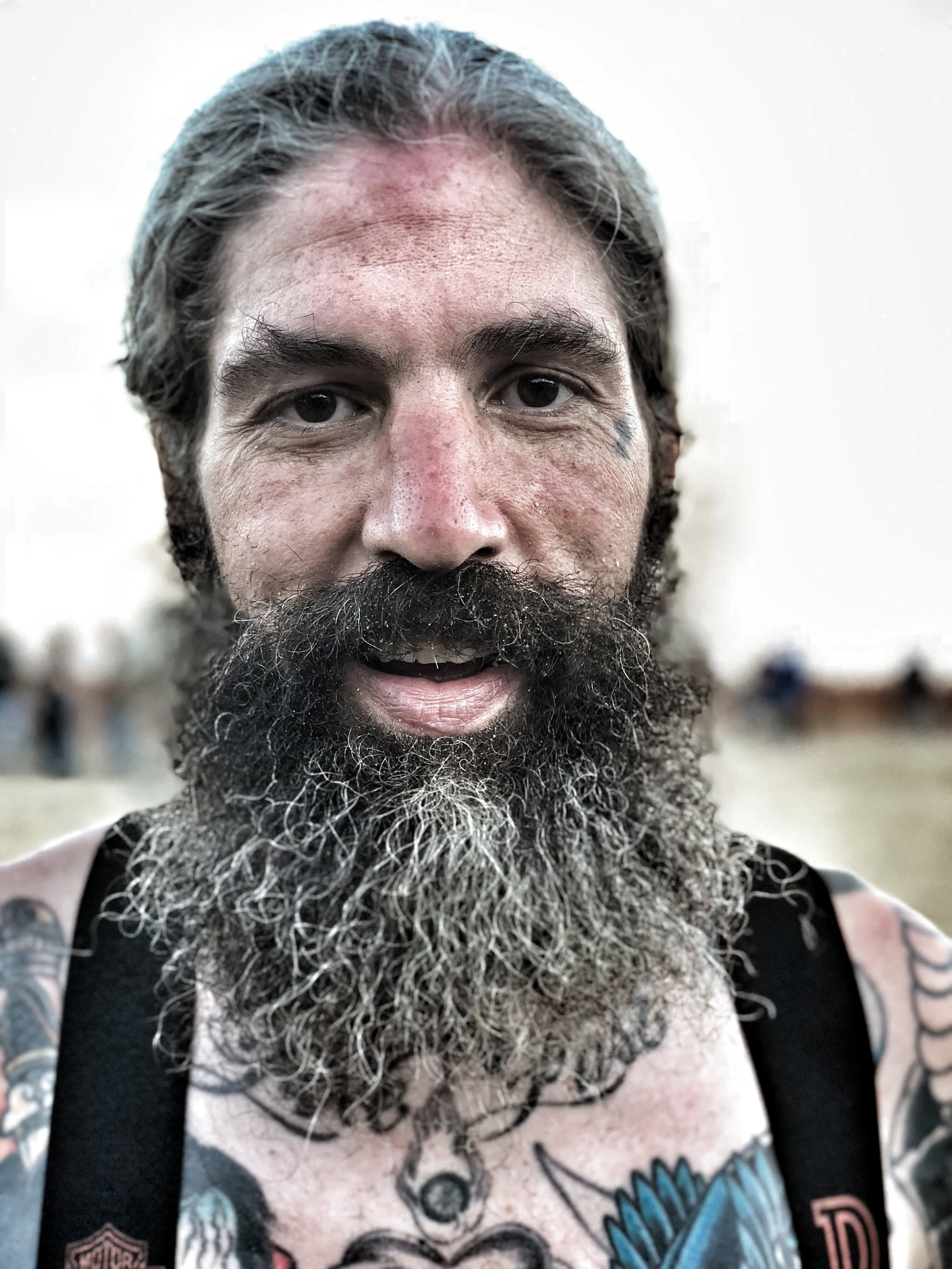 Josh Kohn: Racing the TROG event on his 45 Flathead #77. He is also a tattoo artist!