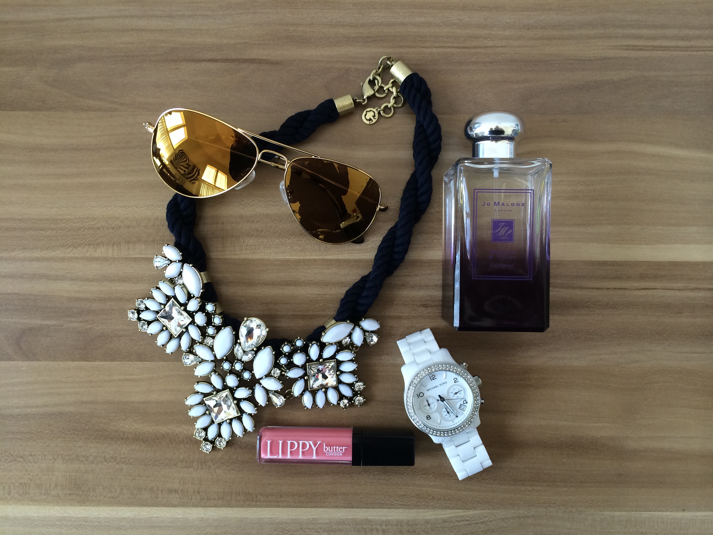 Sunglasses and necklace from C Wonder Store // Fragrance from Jo Malone London// timepiece from Michael Kors// Lipgloss from Sephora