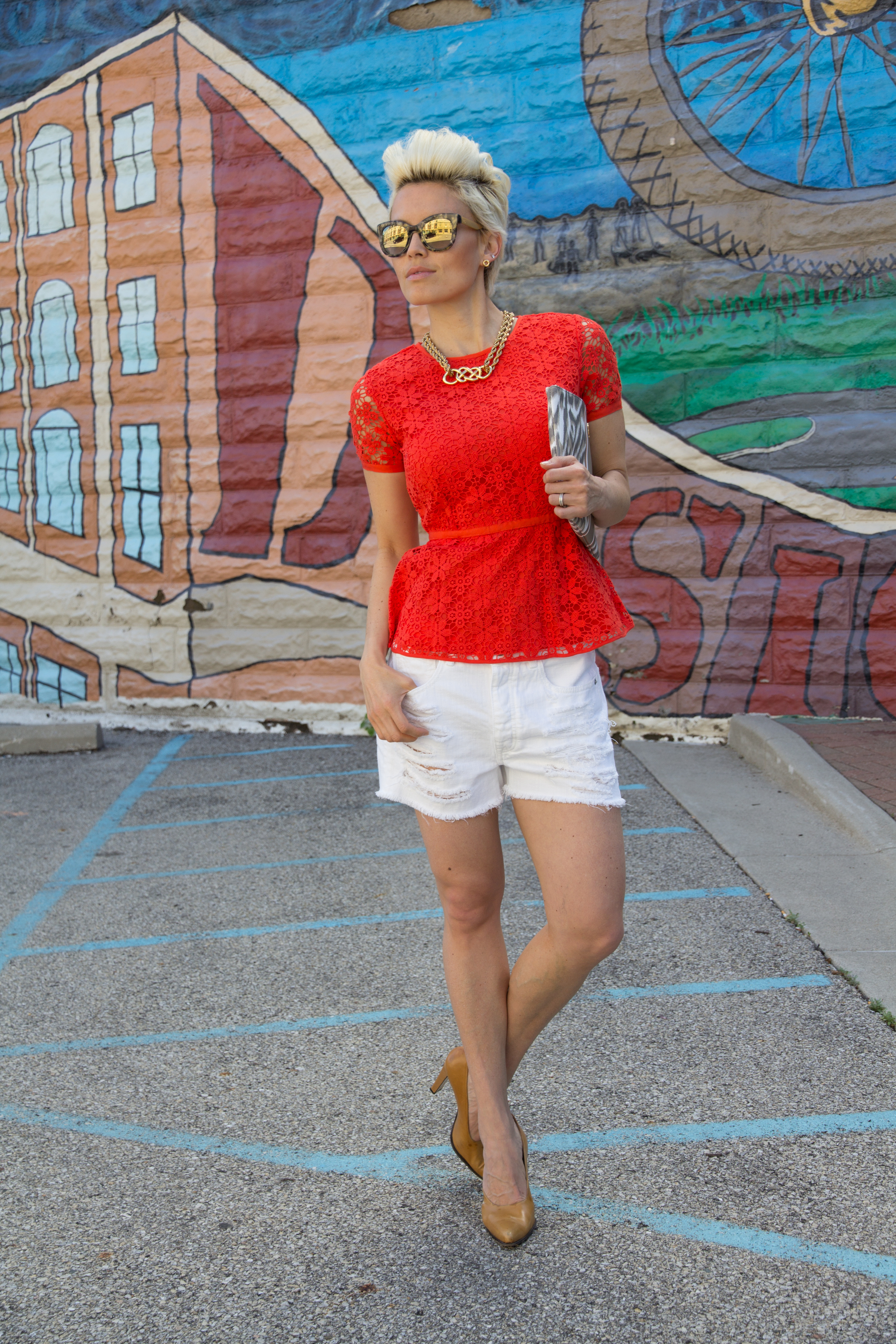Images by Bello' Romance Photo graphy Sunglasses, earrings, necklace, peplum top and clutch from C Wonder / denim from American Eagle / shoes vintage Italian