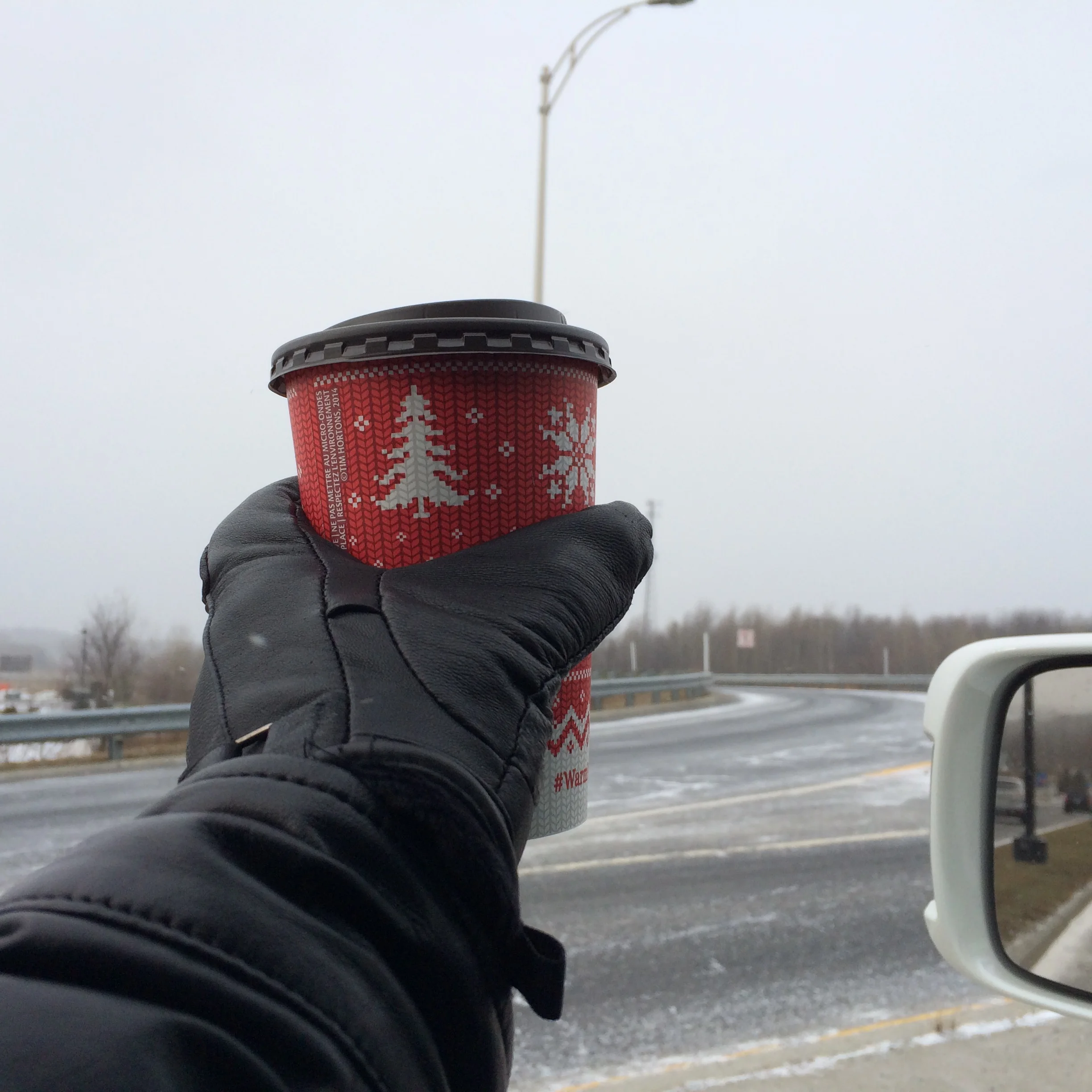 A medium Tim Horton's festive red cup filled with hot deliciousness! (Let's keep it in moderation)