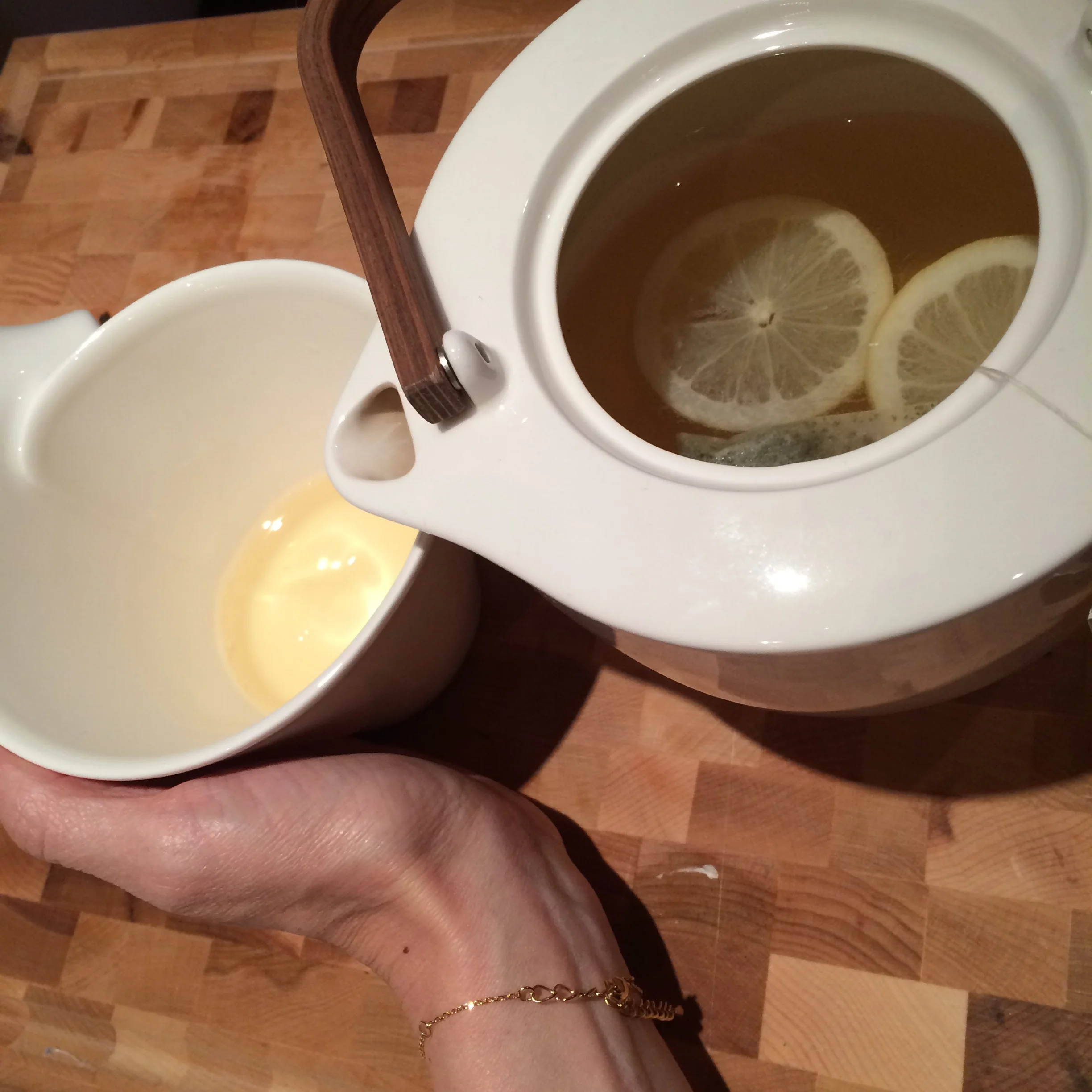 Soothing and detoxing lemon herbal tea and relaxing with a movie.