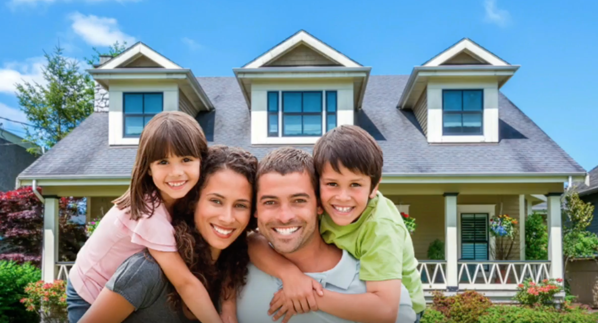 Family in front of House.png