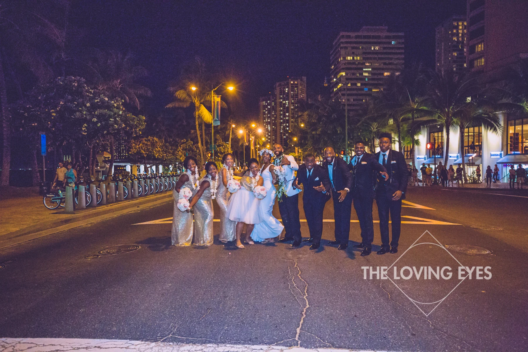 Bridal party on the street at night in Waikiki