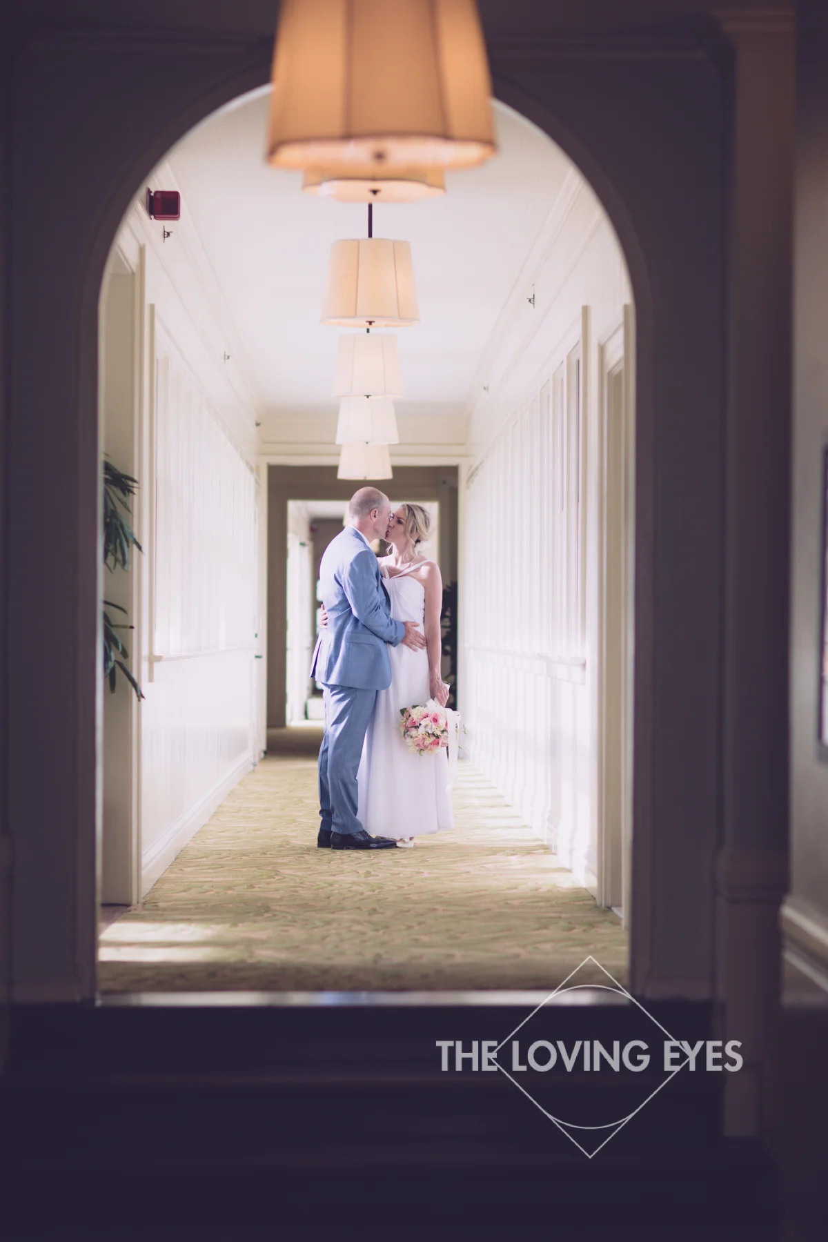 Bride and groom on their wedding day at the Moana Surfrider in Waikiki