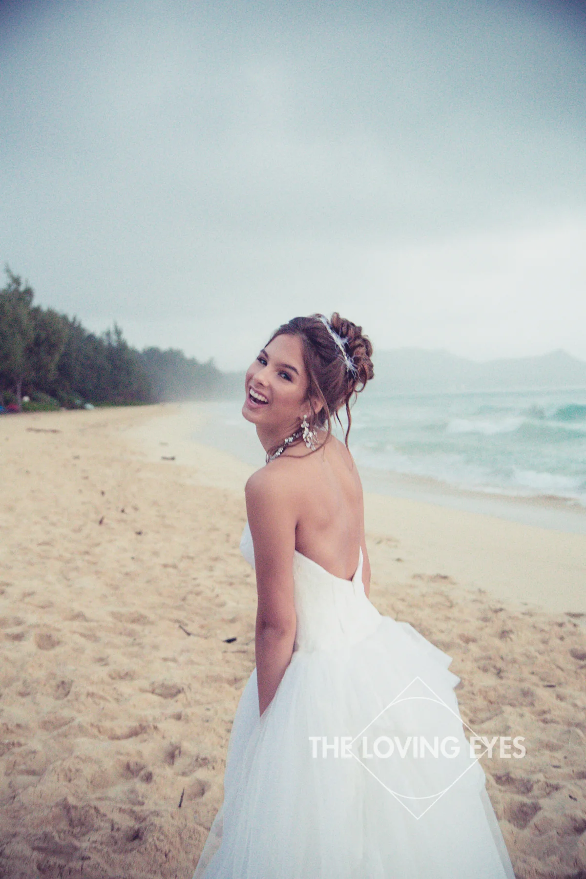Fun Quincennera photo on the beach in Hawaii