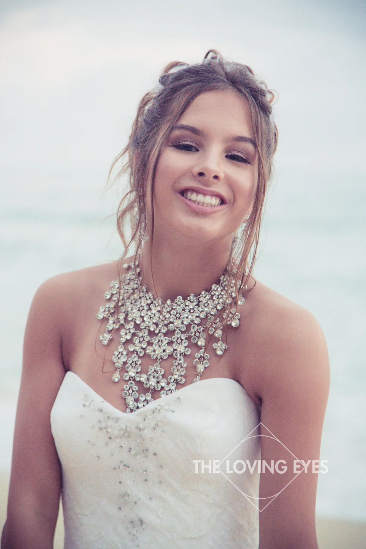 Fun Quincennera photo on the beach in Hawaii