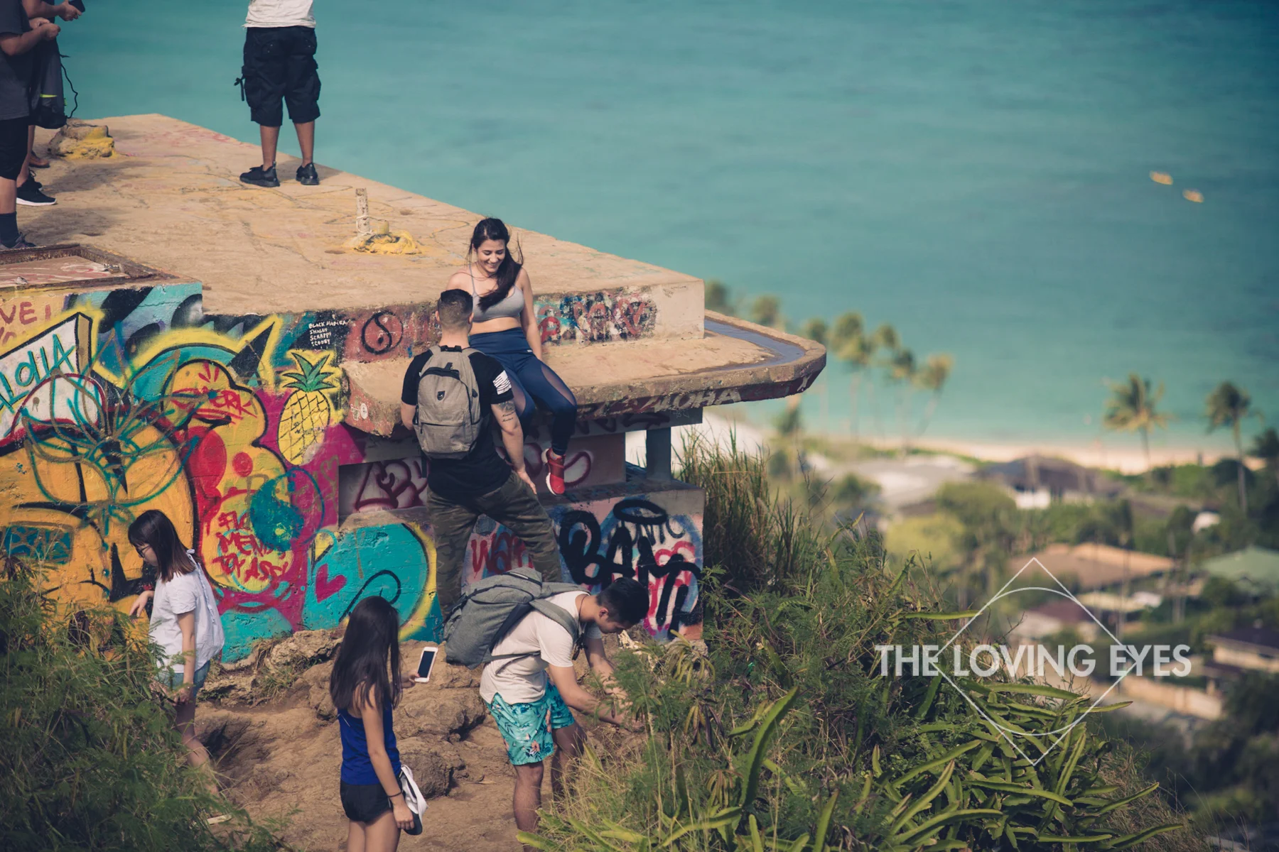 Climbing up the first pillbox at Lanikai Pillbox in Hawaii