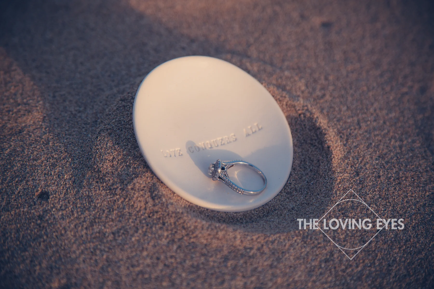 Engagement ring on the beach at Ala Moana Beach Park in Hawaii