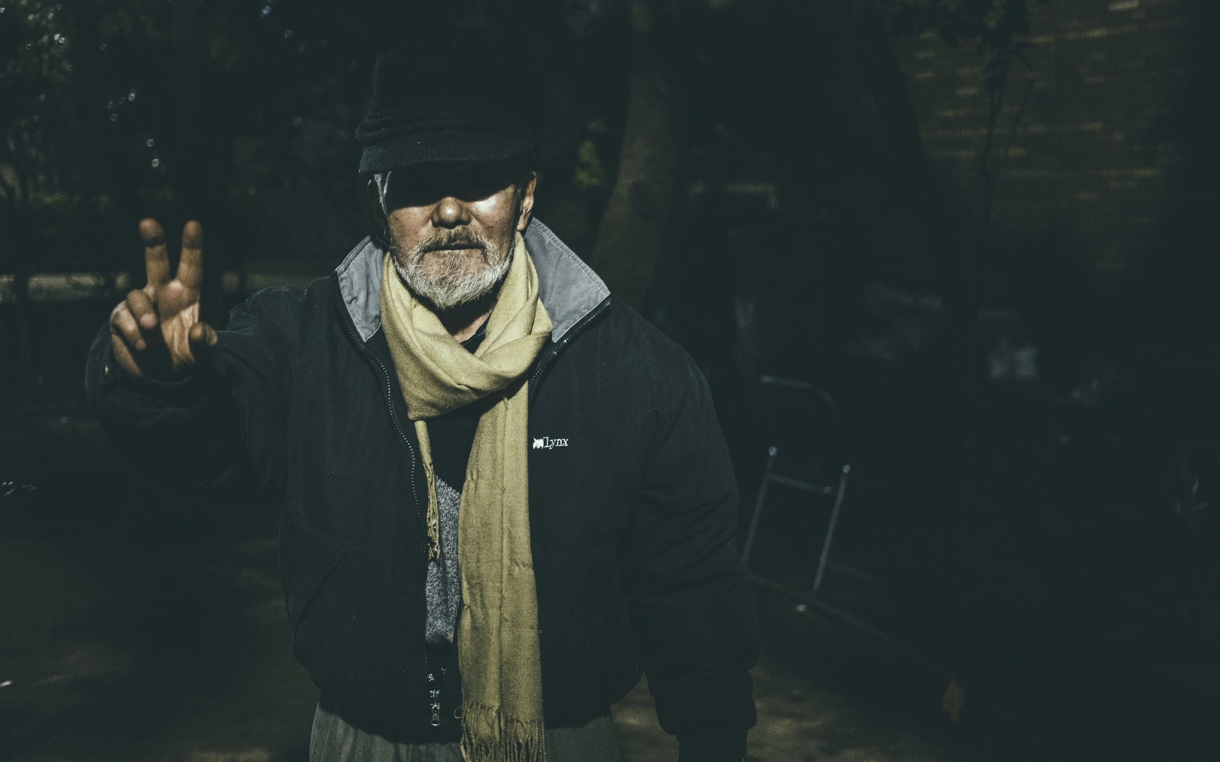He never once show his eyes to the camera, always hiding behind his baseball cap. It was probably so he can get used to the dark living conditions easier.